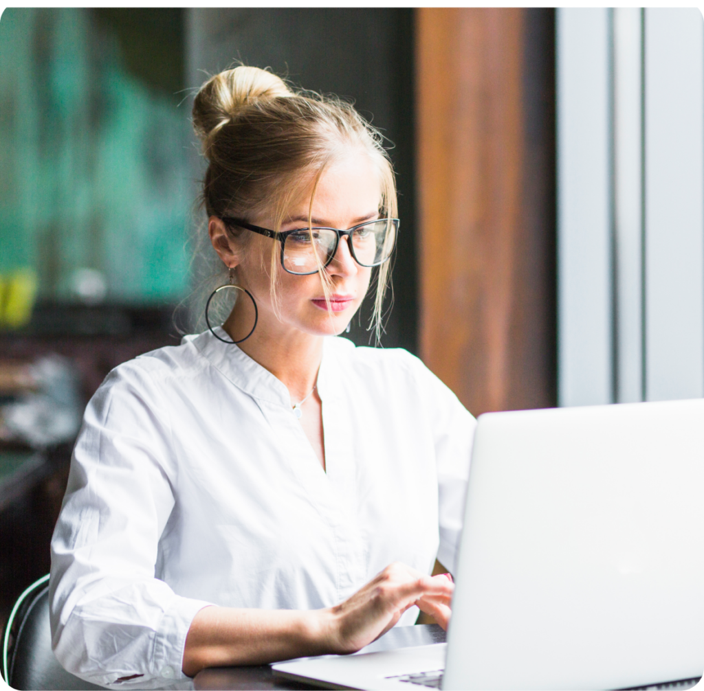 Business woman working on her laptop
